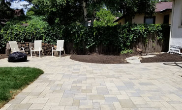 Backyard patio crafted with stone pavers